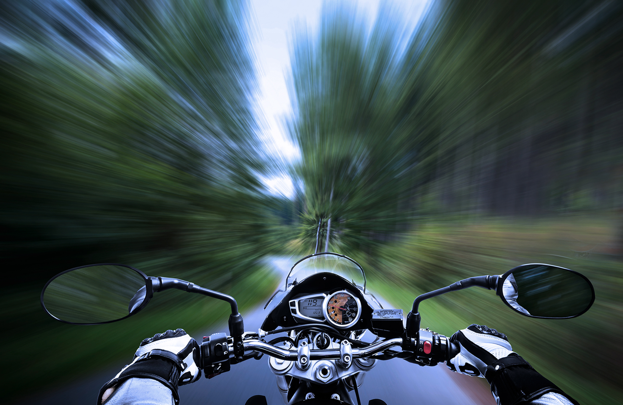 motorcycle speeding, blurred background